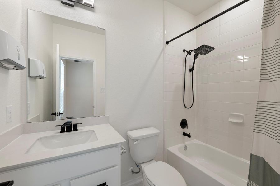 Furnished interior view inside a new home in Sonterra - Cool Water, Jarrell (Image 13).