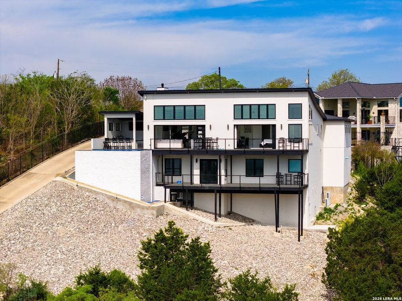 Front exterior of a new home in , Kerrville, TX, highlighting curb appeal (Image 22).