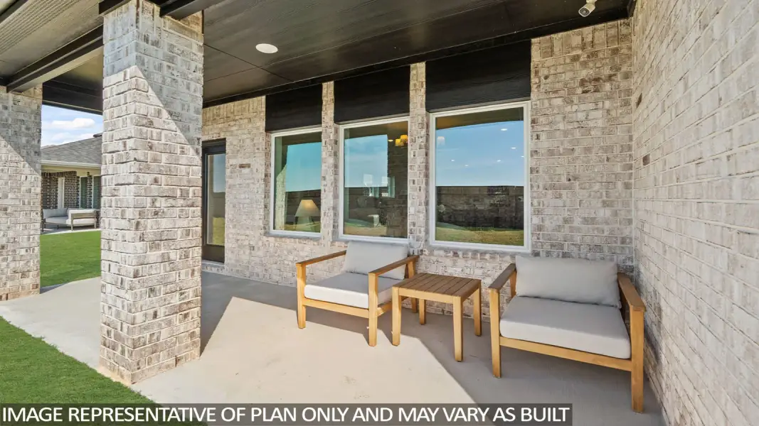 Exterior details and patio area of a home in Sunterra Lakes, Brookshire (Image 22).