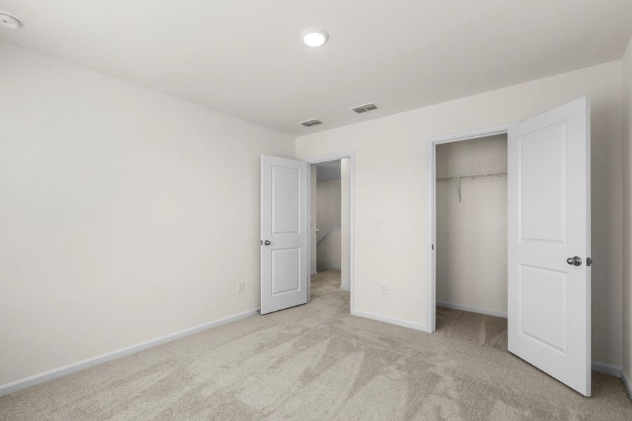 Representative unfurnished interior of a home built from the Highland by Starlight Homes in Sutton Farms, San Antonio (Image 19).