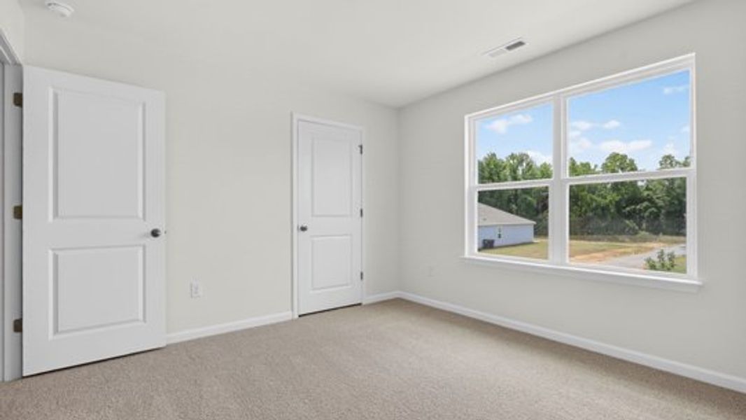 Spacious, unfurnished interior of a new home in Honeycutt Oaks, Angier (Image 23).