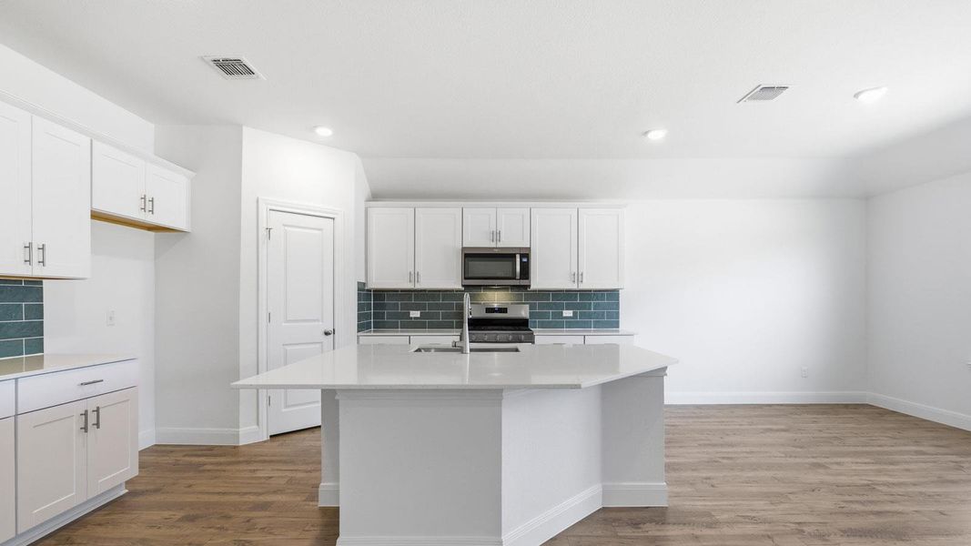 Furnished interior view inside a new home in Railhead, Cedar Creek (Image 5).