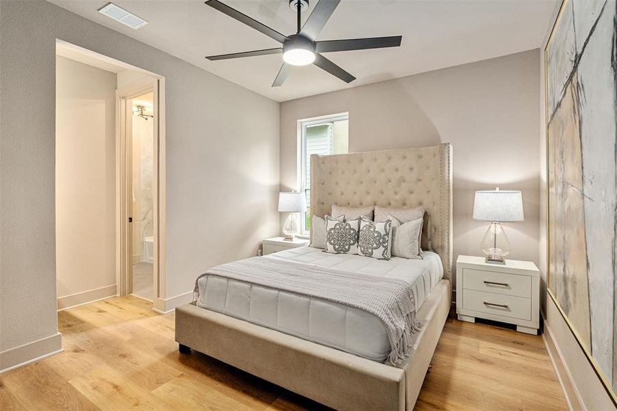 Walk-out level bedroom with private sink & jack & Jill bath Walk-out level bedroom with private sink & jack & Jill bath