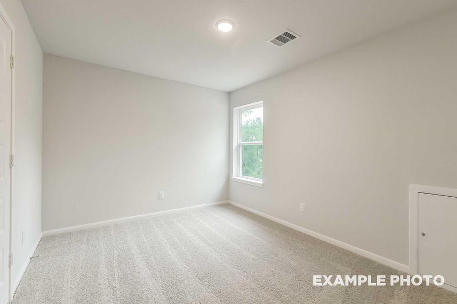 Spacious, unfurnished interior of a new home in Caney Creek Place, Conroe (Image 27).