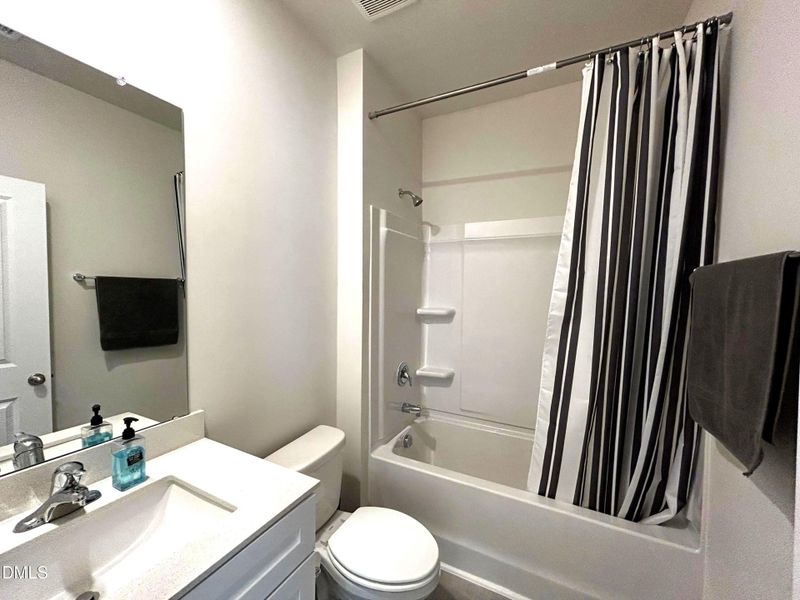 13. The full bath adjoining main level b