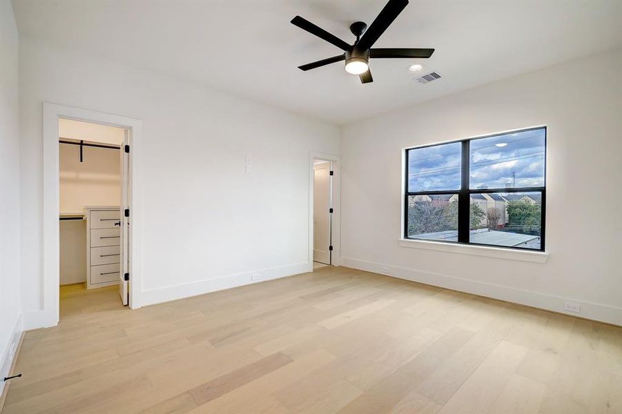 2nd guest bedroom with private bathroom and walk in closet.