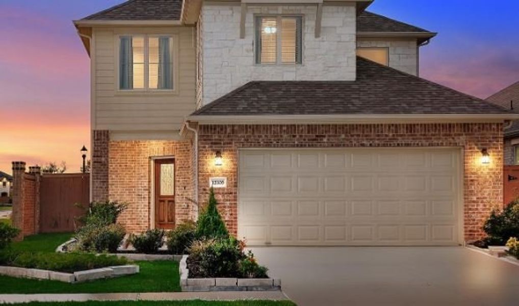 Front exterior of a new home in Balmoral East, Humble, TX, highlighting curb appeal (Image 1). Front exterior of a new home in Balmoral East, Humble, TX, highlighting curb appeal (Image 1).