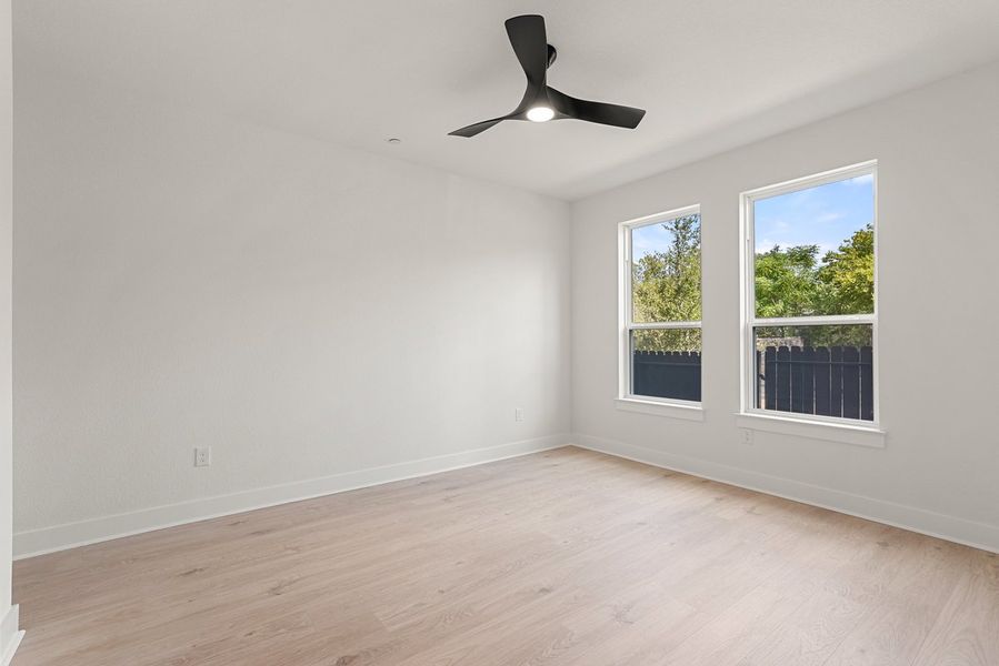Spacious, unfurnished interior of a new home in Koenig Townhomes, Austin (Image 18).