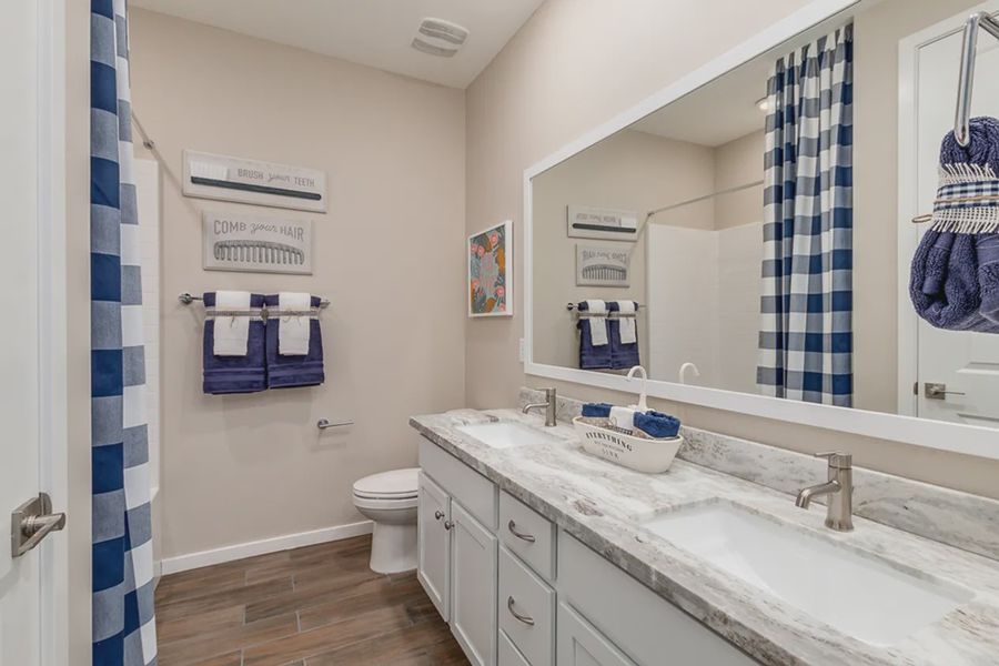 Representative furnished interior of a home built from the Diamond by Elliott Homes in Forté at Granite Vista, Waddell (Image 24).