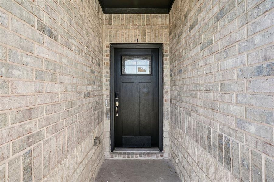 Exterior details and patio area of a home in Lakehaven - Signature Series, Farmersville (Image 3). Exterior details and patio area of a home in Lakehaven - Signature Series, Farmersville (Image 3).
