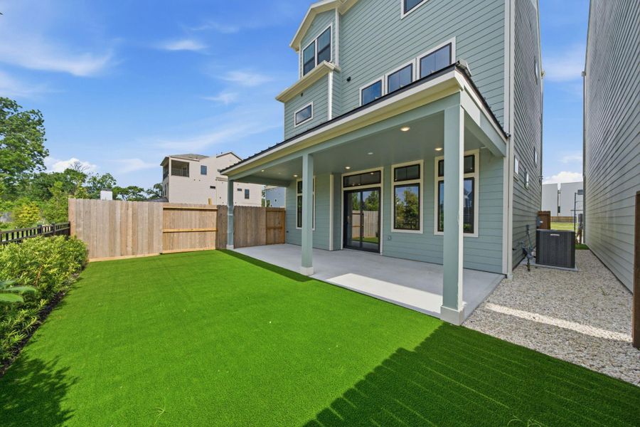 Exterior details and patio area of a home in Spring Valley Creek, Houston (Image 4).