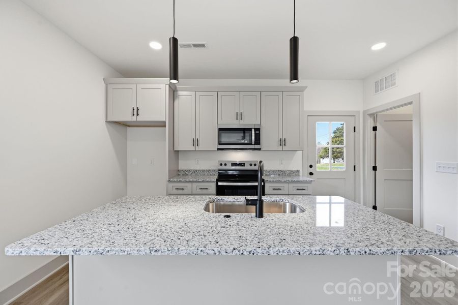 Furnished interior view inside a new home in , Monroe (Image 5).