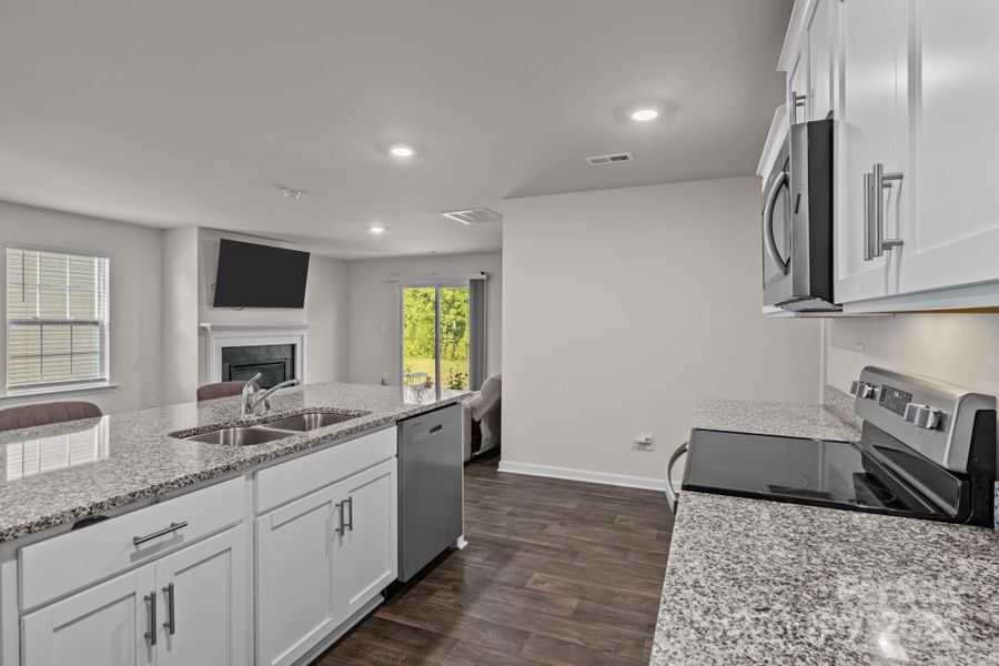 Furnished interior view inside a new home in Mills at Long Creek, Dallas (Image 14).