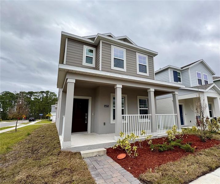 Front exterior of a new home in , St. Cloud, FL, highlighting curb appeal (Image 19).