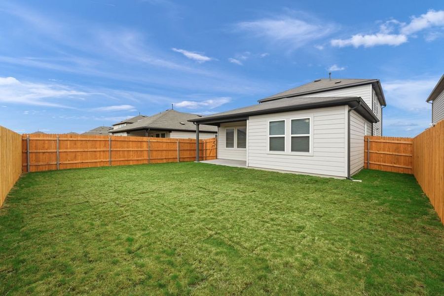 Exterior details and patio area of a home in Longview 40s, Del Valle (Image 3).