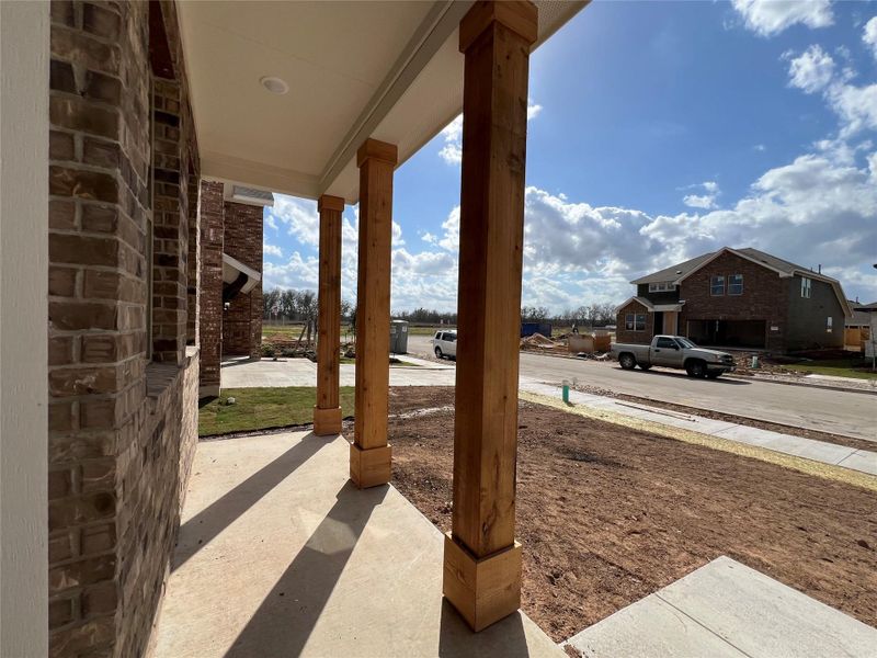 Exterior details and patio area of a home in Rolling Glen, Hutto (Image 4).