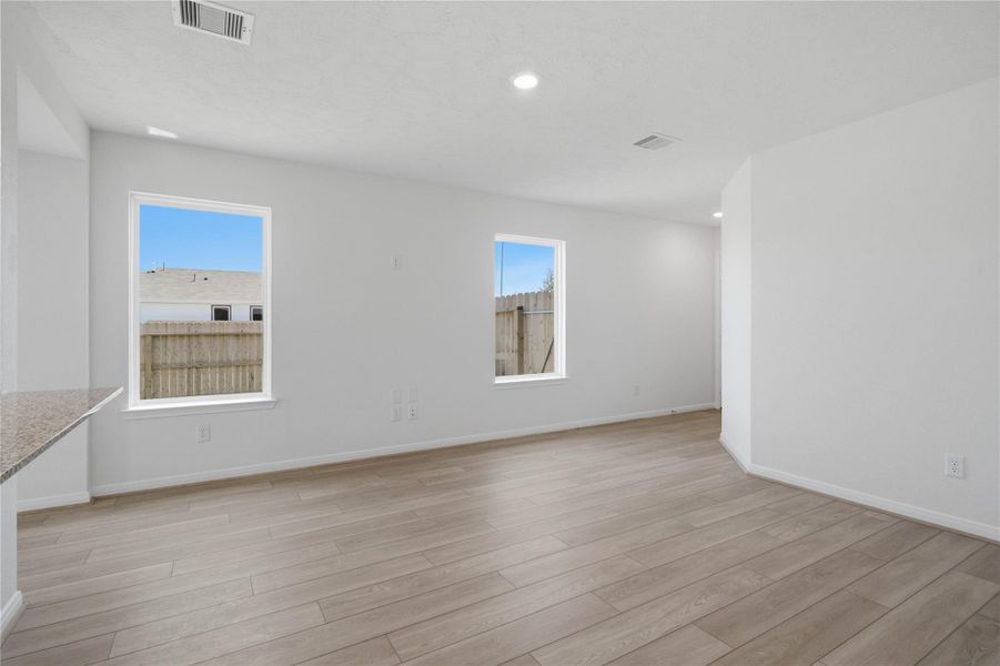 Additional view of this Great Room with the natural light flooding this space.