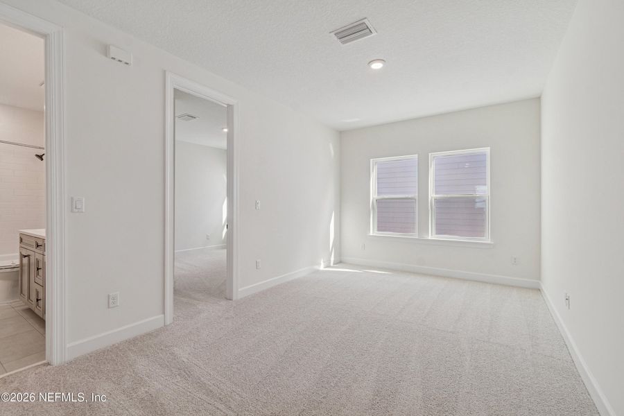 Spacious, unfurnished interior of a new home in Evergreen Island at Silverleaf - Executive, St. Augustine (Image 17).