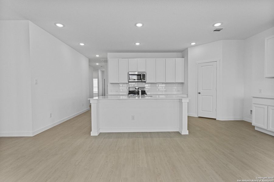 Furnished interior view inside a new home in Hidden Trails: Coastline Collection, Bulverde (Image 3).