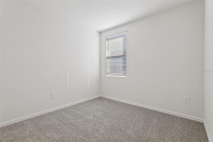 Spacious, unfurnished interior of a new home in Bradbury Creek - Signature Series, Haines City (Image 24).