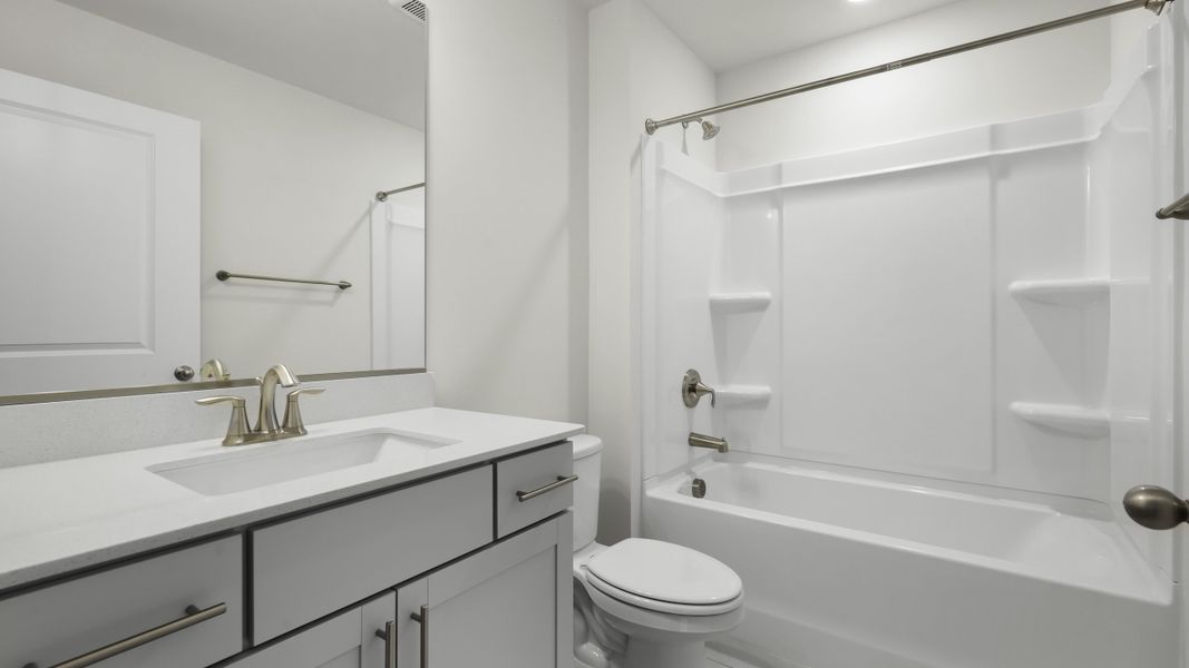 Furnished interior view inside a new home in Lybrook Village, Advance (Image 7).