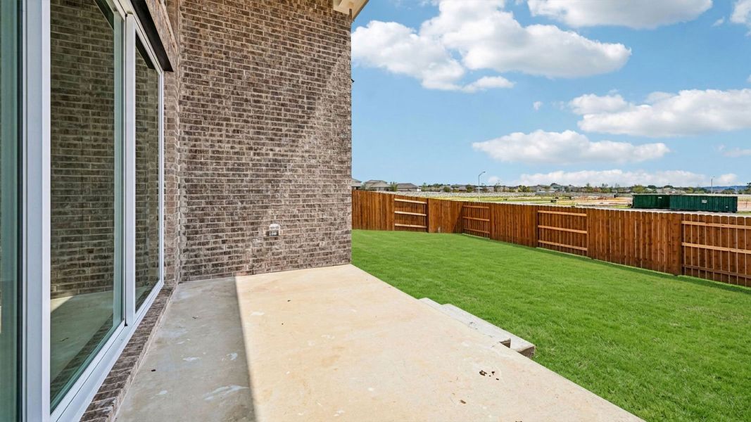 Exterior details and patio area of a home in The Enclave at Bar W Ranch, Leander (Image 3).