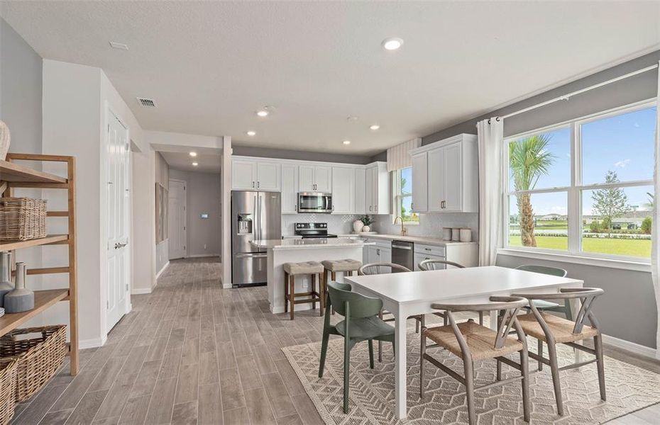 Furnished interior view inside a new home in Del Webb Sunbridge, St. Cloud (Image 8).