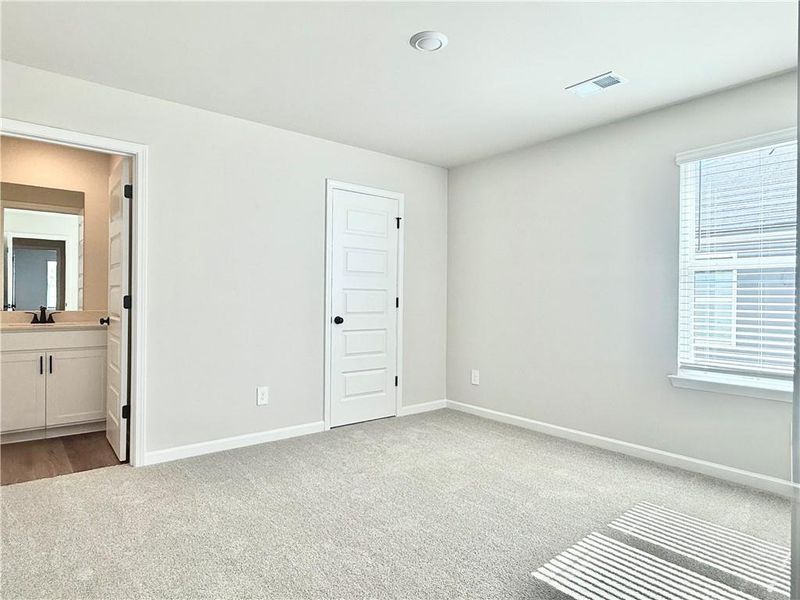 Spacious, unfurnished interior of a new home in Vines at Mill Creek - Estate Series, Braselton (Image 21). Spacious, unfurnished interior of a new home in Vines at Mill Creek - Estate Series, Braselton (Image 21).