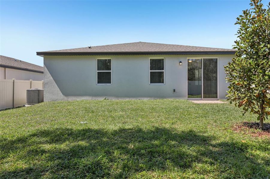 Exterior details and patio area of a home in Lawson Dunes - Signature Series, Haines City (Image 3).