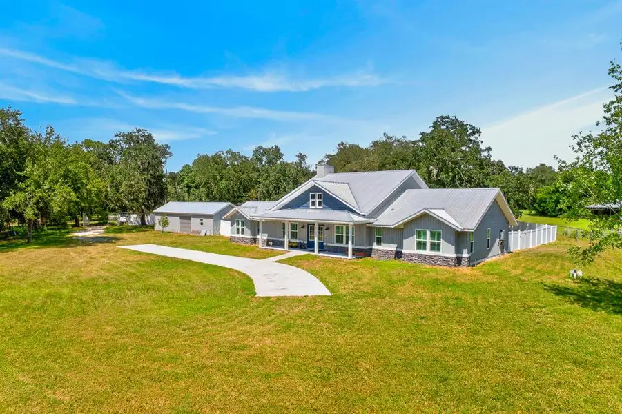 Front exterior of a new home in , Hudson, FL, highlighting curb appeal (Image 25). Front exterior of a new home in , Hudson, FL, highlighting curb appeal (Image 25).