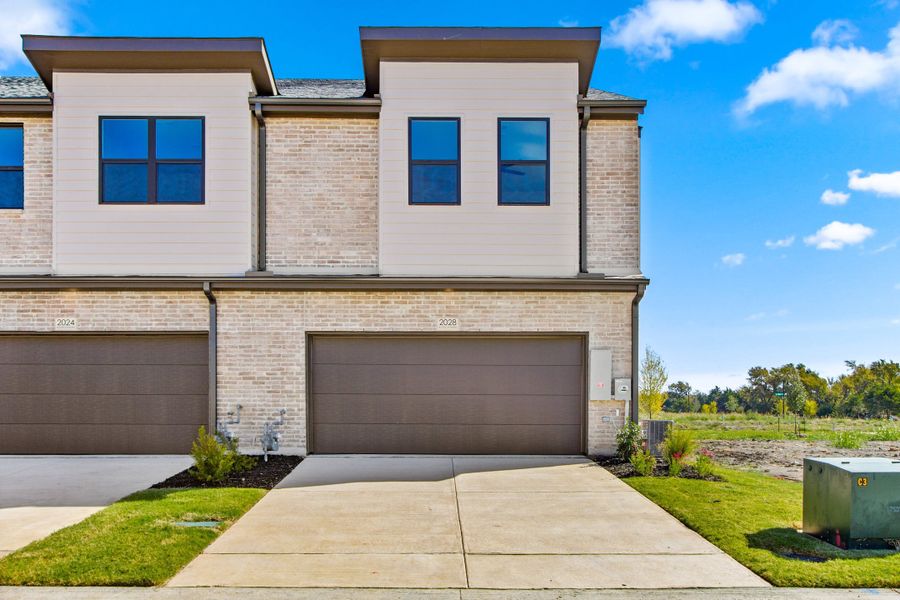 Front exterior of a new home in Ten Mile Creek, Celina, TX, highlighting curb appeal (Image 21).