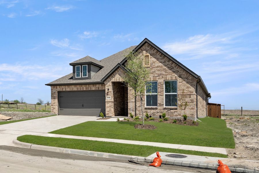 Representative exterior photo of a completed home built from the Liberty by Rockwell Homes in Wildflower Ranch, Fort Worth, TX (Image 27). Representative exterior photo of a completed home built from the Liberty by Rockwell Homes in Wildflower Ranch, Fort Worth, TX (Image 27).