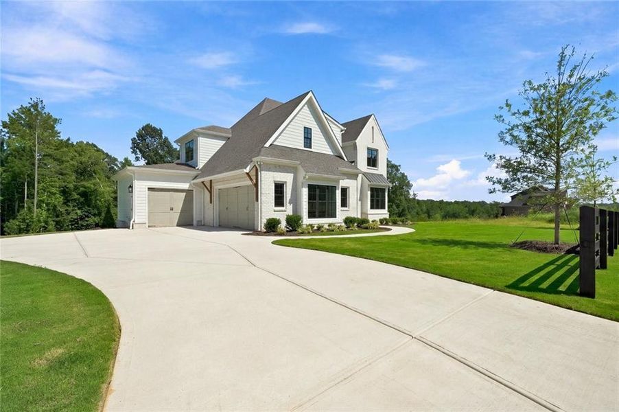 Front exterior of a new home in , Canton, GA, highlighting curb appeal (Image 24).