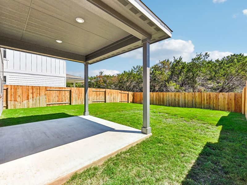 Spend some time outside on the covered back patio or in the backyard.