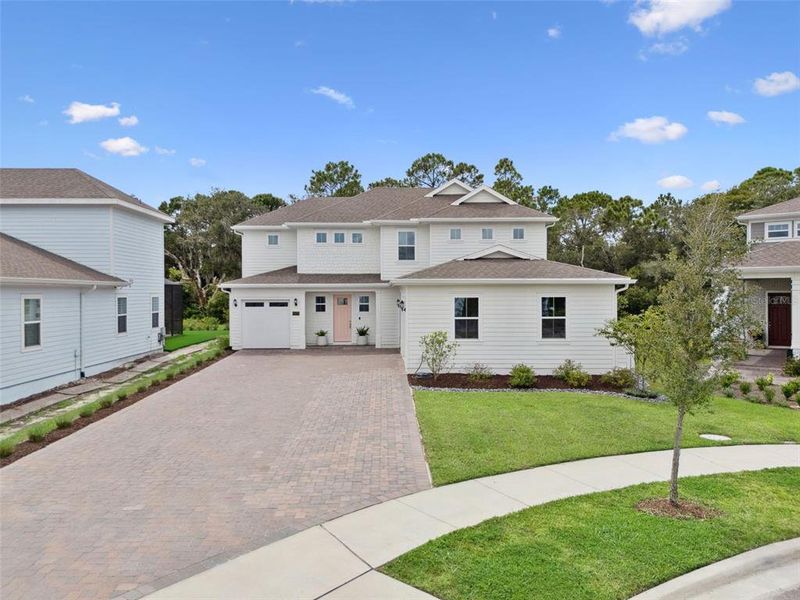 Front exterior of a new home in , St. Cloud, FL, highlighting curb appeal (Image 20).
