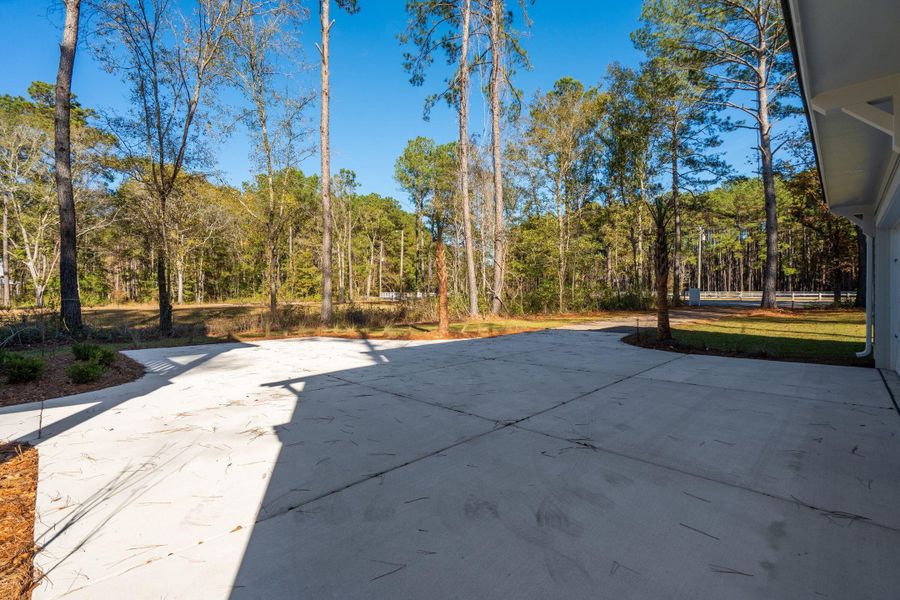 Exterior details and patio area of a home in , Awendaw (Image 32).