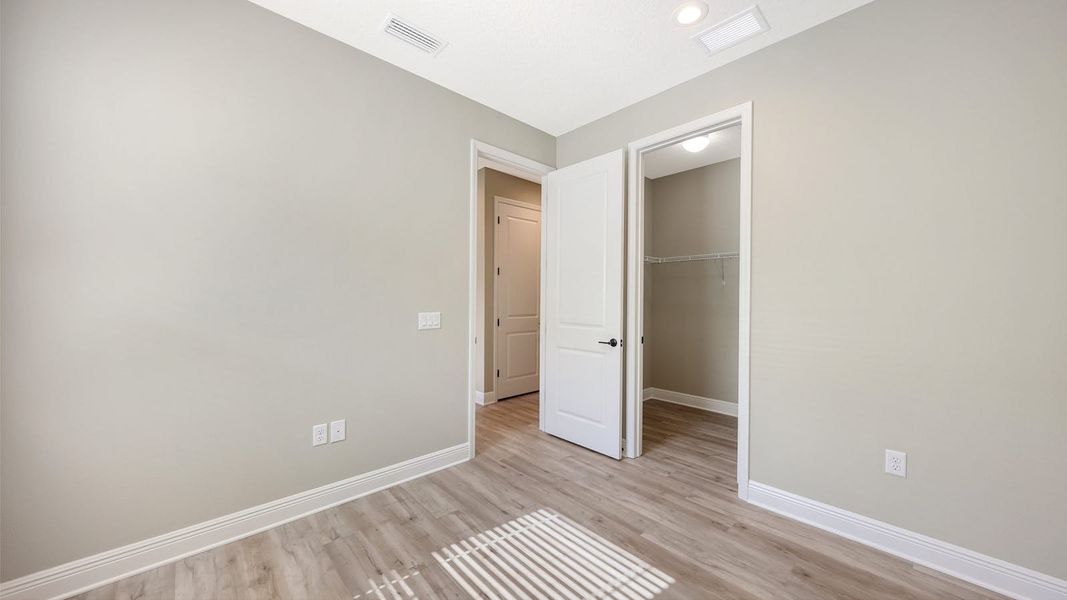 Spacious, unfurnished interior of a new home in Palm Grove Real Estate and Homes for Sale in Lakewood Ranch, FL - Neal Communities, Lakewood Ranch (Image 38). Spacious, unfurnished interior of a new home in Palm Grove Real Estate and Homes for Sale in Lakewood Ranch, FL - Neal Communities, Lakewood Ranch (Image 38).