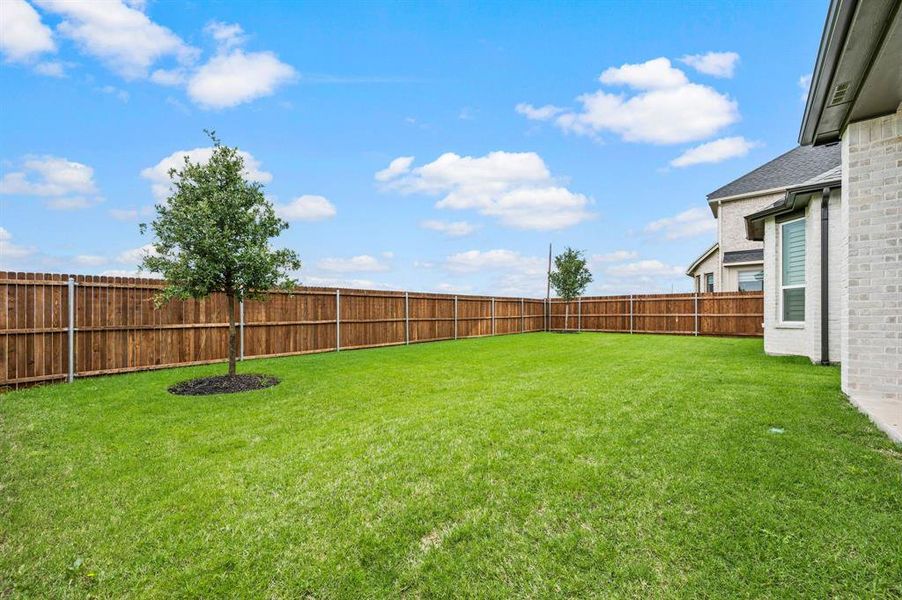 Exterior details and patio area of a home in Wildflower Ranch, Fort Worth (Image 28).