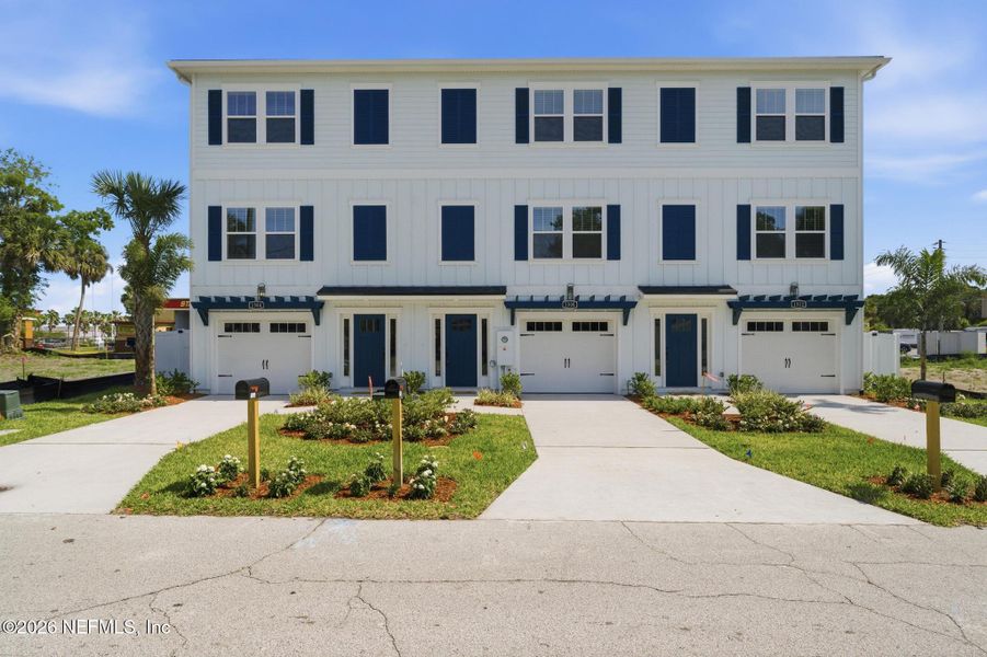 Front exterior of a new home in , Jacksonville Beach, FL, highlighting curb appeal (Image 1). Front exterior of a new home in , Jacksonville Beach, FL, highlighting curb appeal (Image 1).