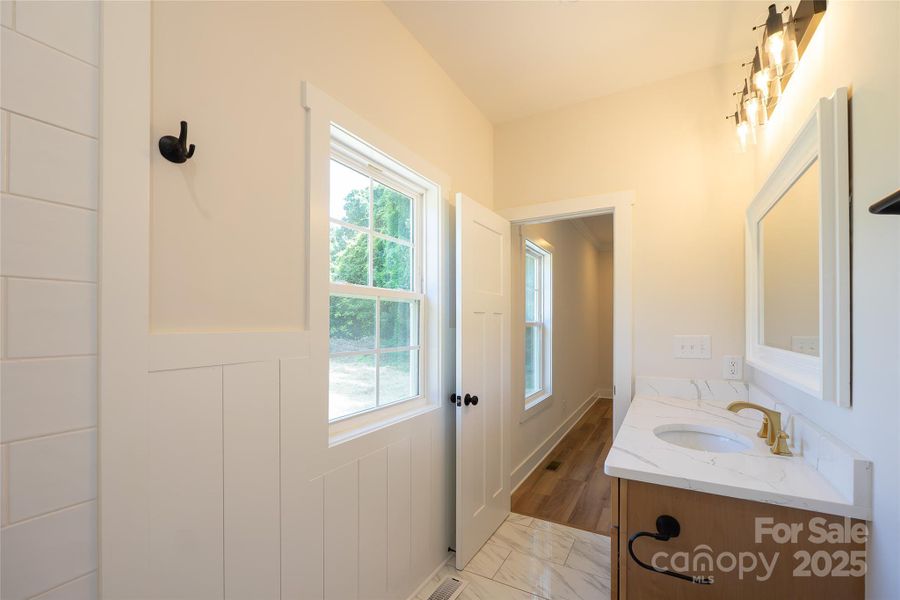 Furnished interior view inside a new home in , Huntersville (Image 9).