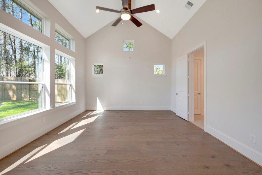 Spacious, unfurnished interior of a new home in The Woodlands Hills - Premier Collection, Willis (Image 29).