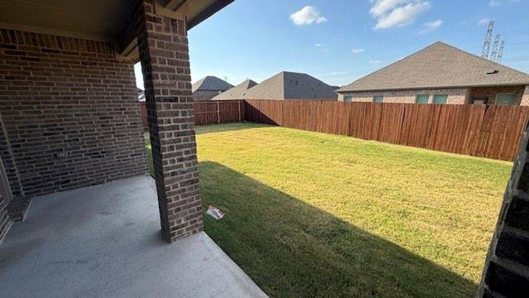 Exterior details and patio area of a home in Fireside by the Lake, Garland (Image 3). Exterior details and patio area of a home in Fireside by the Lake, Garland (Image 3).