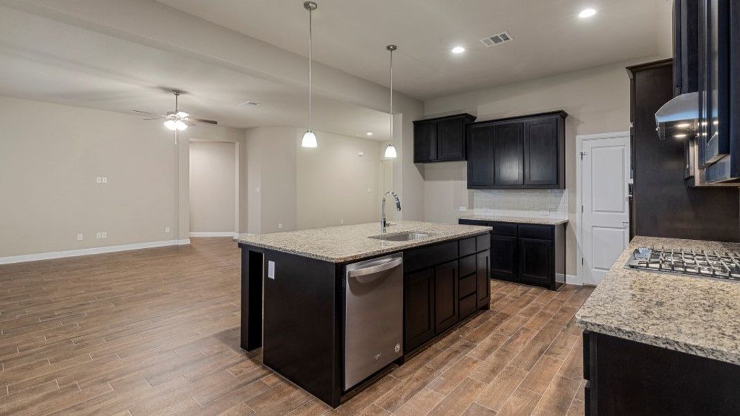 Representative furnished interior of a home built from the Guadalupe by D.R. Horton in Eden Ranch, Arlington (Image 10).