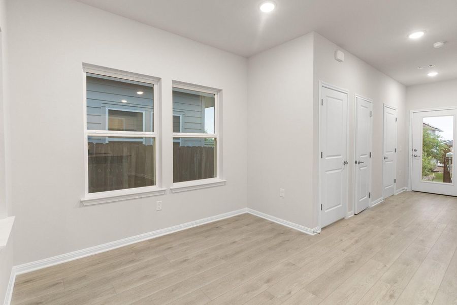 Spacious, unfurnished interior of a new home in Whisper Valley, Manor (Image 27).