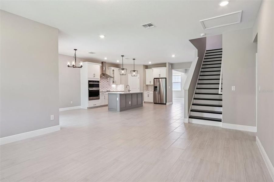 Spacious, unfurnished interior of a new home in Legends Preserve - Signature Series, Daytona Beach (Image 22).