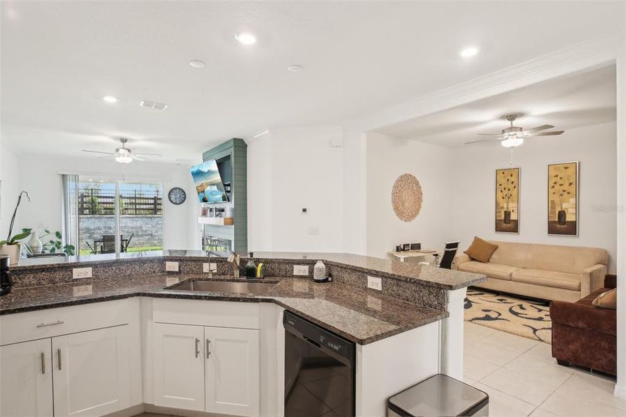Breakfast bar area with you into office space. Breakfast bar area with you into office space.