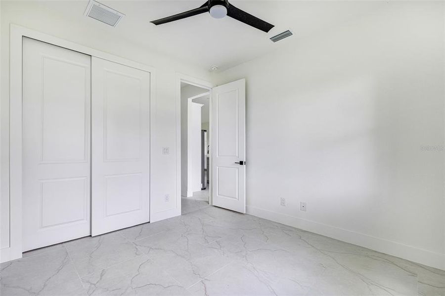Spacious, unfurnished interior of a new home in , Port Charlotte (Image 29).
