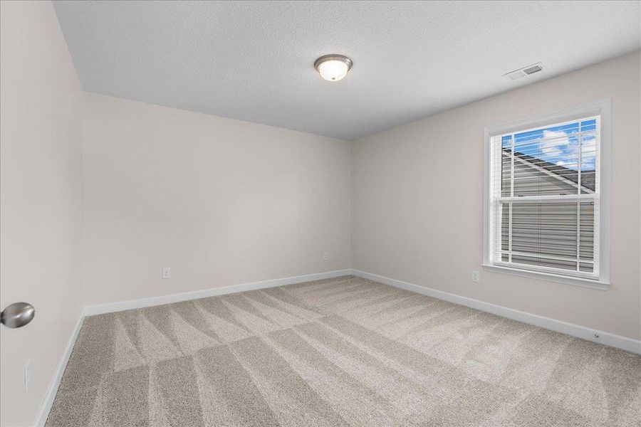 Spacious, unfurnished interior of a new home in Fall Creek, Inman (Image 20).