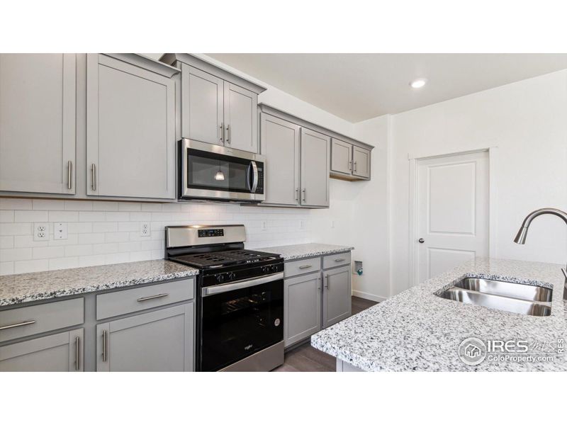 Furnished interior view inside a new home in Vantage, Berthoud (Image 7).