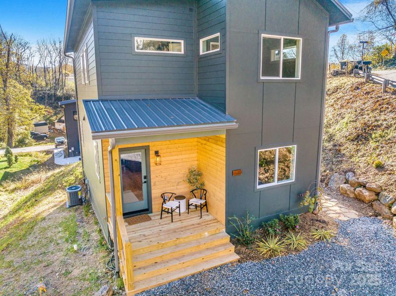 Exterior details and patio area of a home in , Asheville (Image 29).